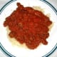 Pour meat mixture over pasta, then serve!