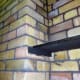 Natural Brick as an alternative background for photography, concealed behind the backdrop curtains.