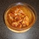 Chicken wings are evenly coated in the spice paste