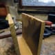 Fixing the front and back to the base of the remote control holder