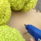 Glue the base of the Hedge Apple Christmas Tree
