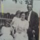Ava as a toddler with siblings, mother and father