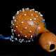 The Ghanaian beaded gourd instrument axatse.