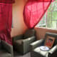 A comfortable sofa set along with the gifted picture of Baba which was requested by the grateful family.