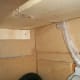 One of the shelf supports. A gap was left behind the shelf for air conditioner electrical cord.
