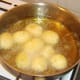 Peeled potatoes are deep fried
