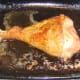 Roast turkey drumstick removed from the oven
