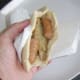 Sausages and turkey are stuffed in to pitta bread