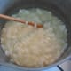 Mix the wax around occasionally with a wooden chopstick or spoon.