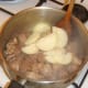 Onion is added to browned pork and venison