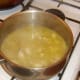 Pork is simmered in chicken stock