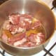 Browning pork in oil