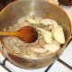 Onion and seasoningss are added to sealed pork