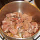 Browning and sealing pork meat in oil