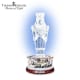 The nutcracker stands on top of a crystal drum.