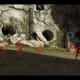 There's something interesting at the base of the statue, but first, turn around and check these treasure spawning spots.