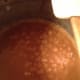 In a few minutes, you'll notice that it starts to bubble because it is going to boil. Stop stirring and set the timer for 5 minutes.