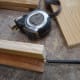 Using a straight edge and pencil draw a line down the centre of each shelf support.