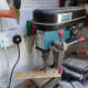 Drill a hole (the same thickness as the dowel) at each marked point.