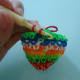 Pull the rubber band through the loop as usual. But do not get the rubber band at the back just yet.