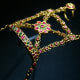 Worn on the back of the hand as wedding jewelry, this Indian Hathphul made of gold,