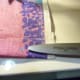 This is the top hem of the case. The opening where you insert the pillow. Don't pin the open part, but pin corners together.
