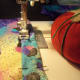 Remove pins right before the foot gets near it. Make sure to put them in the pincushion as you remove them.