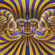 This optical illusion works by contrasting colours and shapes. Faces are included giving a double effect of moving lines and different perspectives for the middle and side faces