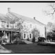 Other side view showing gabled roof & the same left chimney (northwest front perspective) .