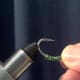 Flip the hook over and set in the tying vice as shown