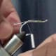 Secure lead wire with thread
