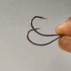 Comparison of original hook (above) to bent hook (below)