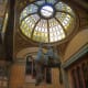 Statue of St. Wenceslas riding an inverted horse. It is located in the entrance to the Lucerna theater on the southeast side of Wenceslas Square. Sculpture by David Cern