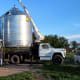 On this job with another 18-foot diameter, 4,000 bushel bin, we had a crew of four people including the boom truck operator and cameraman.