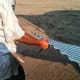 Drift punches are used as handles to drag wall sheets from the pile to the bin perimeter.