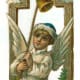 Vintage little boy Christmas angel ringing a bell