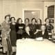 Standing left to right: Alma, my grandmother and others gathered for a birthday party celebration.