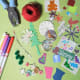 Gather together embellishments, such as, stickers, pens, die cuts and punched Christmas motifs.