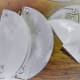 Use a medium weight vellum paper. Fold in half and punch one end with a desired design. Punch the other end with a smaller design of the same motif.