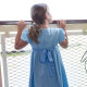 Back view. I had a hair ribbon in the same fabric as the bow around her waist, but left it at home by accident.
