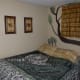 Pictures and bed coverings fit the general theme