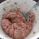 Mix meat in by hand.