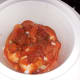 Place chicken in the crock pot and cover with tomato soup and salsa.