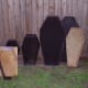 My sister made coffins in various sizes for Halloween ard displays. Family photo, Vernatopia.com.