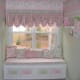 pink and white bedroom with balloon curtains