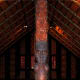 Inside Te Whare Runanga Maori meeting/community house in New Zealand at Waitangi Treaty Grounds.