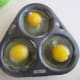 Eggs in poacher pan