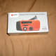 Hand cranked radio/flashlight/cell phone charger and more. Also with a solar panel as an optional source to power the device.