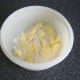 Butter is cut in to flour in a mixing bowl