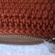 I stitched on the LAST HDC round, so the zipper won't get caught in the crocheted purse.